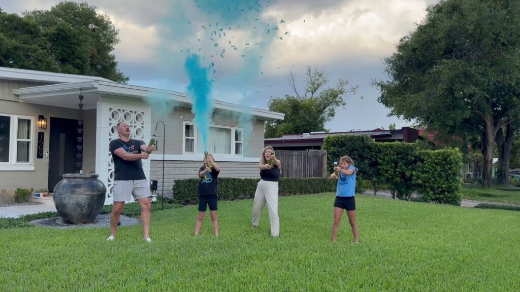 Best gender reveal confetti powder cannon exploding in air blue smoke