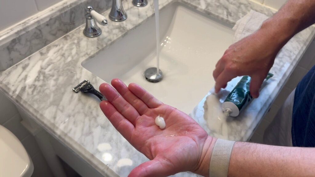 Best Men's Shaving Cream for sensitive skin - Proraso cream in hand