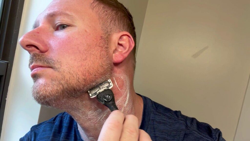Shaving neck with razor and Proraso shaving cream