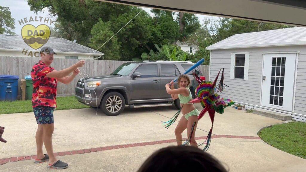 action shot - Strong birthday piñata for adults and kids - Mexican star piñata review