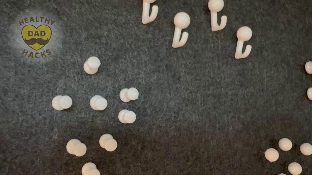 Best Cork Board Wall Tiles - WallHero product review - white pins pinned into felt