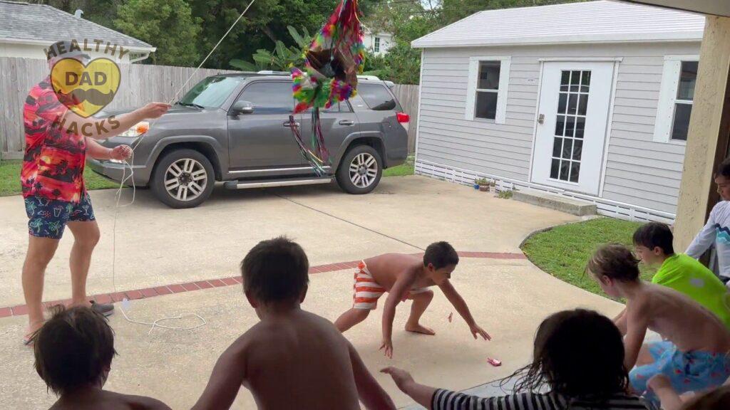 action shot - Strong birthday piñata for adults and kids - Mexican star piñata review