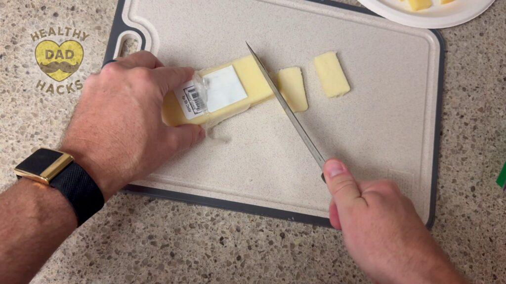 PP side - cutting cheese on Sumzzz double-sided cutting board