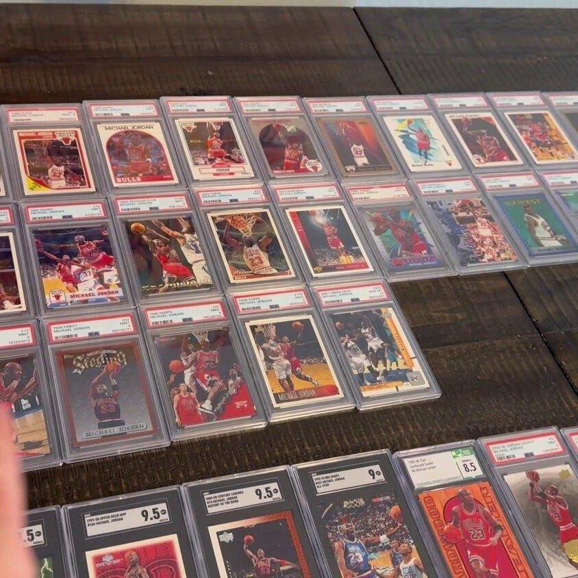 Michael Jordan base cards my collection laid out on table